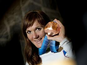 Petra Majdič z olimpijskim bronom.