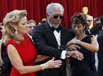 Morgan Freeman s producentko Lori McCreary in hčerko Morgano