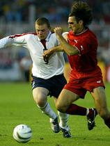 Wayne Rooney in Goran Stavrevski (Makedonija)