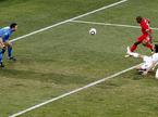 Samir Handanovič in Jermain Defoe
