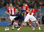 Andres Iniesta, Victor Caceres in Antolin Alcaraz