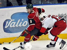 Mikko Koivu (Minnesota) in Tuomo Ruutu (Carolina)