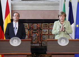 Francois Hollande in Angela Merkel
