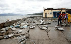 Tajfun Nock-Ten zahteval štiri žrtve, zdaj se bliža Manili