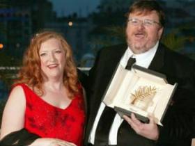 Michael Moore z ženo in zlato palmo