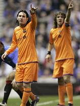 Lionel Messi in Carles Puyol