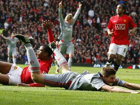 Patrice Evra in Steven Gerrard
