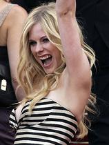 Lets say Avril Lavigne has a nice smile but if you look closely it can 