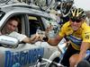 Johan Bruyneel in Lance Armstrong sta sedemkrat nazdravila na Elizejskih poljanah v Parizu. Foto: EPA