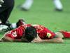 Mladi portugalski zvezdnik Ronaldo je po koncu tekme obležal na igrišču.