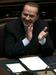 Berlusconi se poleg škandalov spoprijema še s politično in gospodarsko krizo, a je vseeno preživel novo glasovanje o zaupnici vlade. Foto: Reuters