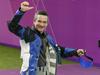 Mirni in zadržani Rajmond Debevec je po zadnjem 10. finalnem strelu zasluženo dvignil roke - olimpijska medalja ni bila ogrožena niti trenutek. Foto: STA