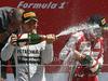 Nico Rosberg (levo) je v Silverstonu vknjižil tretjo zmago v karieri, drugo v letošnji sezoni. Foto: Reuters