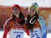 Tina Maze in Dominique Gisin sta ciljno črto prečkali sočasno oziroma do stotinke natančno. Foto: Reuters