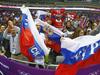 Ruski navijači si ne le želijo, ampak od svojih hokejistov zahtevajo zlato olimpijsko medaljo. Foto: Reuters