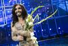 Bradata diva Conchita Wurst je na Evroviziji v Köbenhavnu navdušila s svojo pojavo in pesmijo Rise Like A Phoenix. Foto: EPA