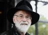 Terry Pratchett je leta 1994 dobil britansko knjižno nagrado (British Book Award) za najboljšega avtorja znanstvene fantastike in fantazijskih romanov. Piše za mladino, najbolj pa je znan po svojih romanih iz serije o Plošči, ki obsega več kot 30 knjig in je prevedena v 20 jezikov. Foto: AP