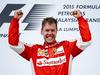 Sebastian Vettel je v velikem slogu dobil dirko za VN Malezije. To je bila njegova jubilejna 40. zmaga v formuli ena, s štirimi zmagami pa je postal tudi najuspešnejši dirkač v zgodovini dirk za VN Malezije. Foto: EPA