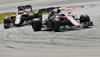 Fernando Alonso in Jenson Button