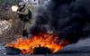 Izraelski vojaki in policisti na okupiranih ozemljih pogosto uporabljajo prave naboje proti Palestincem, ki so neoboroženi ali mečejo kamne. Foto: Reuters