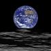 Lunin satelit Lunar Reconnaissance Orbiter (Nasa) je nedavno na fotografijo ujel tako površje Meseca kot Zemljin vzhod. Za zdaj si te sive površine ne lasti nihče. Foto: NASA/Goddard/Arizona State University