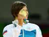 Tina Trstenjak bo od države, kot dobitnica zlate medalje na olimpijskih igrah v posamičnih športih, prejela 17.160 evrov. Foto: Reuters