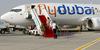 Letalska družba FlyDubai v skladu z odločitvijo oblasti ukinja lete v Katar in iz njega. Foto: Reuters