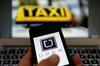 Uber je v številnih državah po svetu sprožil proteste taksistov in ne nazadnje tudi tožbe. Delovanje Uberja namreč odpira številne pravne dileme tudi z vidika delovnopravne in davčne zakonodaje. Foto: MMC RTV SLO