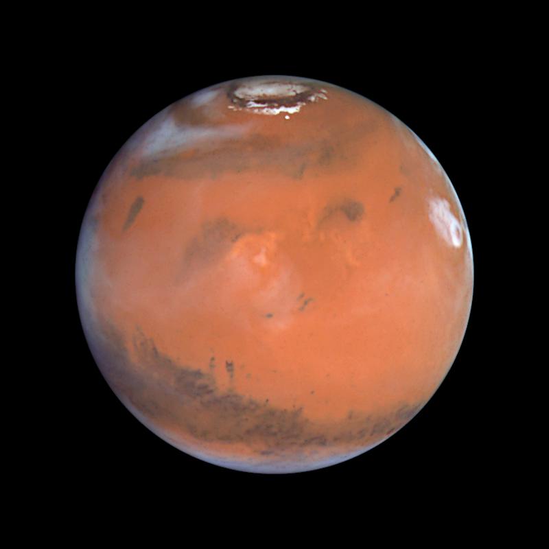 Mars skozi Hubblovo lečo. Foto: Reuters Mars skozi Hubblovo lečo. Foto: Reuters