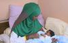 Policisti so med preverbo prijave vsiljivega beračenja opazili, da tujka iz Somalije rojeva. Foto: MMC RTV SLO