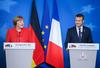 Ključna za krepitev evropske obrambne integracije je podpora Francije in Nemčije. Francoski predsednik Emmanuel Macron (na fotografiji z nemško kanclerko Angelo Merkel) je izrazil upanje, da bosta državi na medvladni konferenci 13. julija naredili korak naprej pri krepitvi obrambnih vezi med državama. Foto: EPA