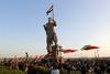 V pokrajini Kirkuk, ki ni del iraškega Kurdistana, a bo referendum potekal tudi tam, so postavili spomenik pešmergam, kurdskim bojnim enotam. Foto: Reuters