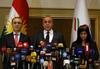 Vodstvo volilne komisije na čelu s predsednikom Handrinom Muhamedom Salihom v Erbilu predstavlja izide referenduma, ki ga vlada v Bagdadu, sosednje države in svetovne sile ne priznavajo. Foto: EPA