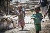 Številni otroci na Madagaskarju so podhranjeni, zaradi česar so manj odporni proti boleznim. Foto: EPA