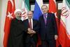 Rohani, Putin in Erdogan so se kljub podpiranju različnih strani v Sočiju zbrali na pogovorih za mir v Siriji. Foto: Reuters