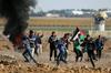 Palestinski protestniki v Gazi. Velika večina prebivalcev Gaze zaradi izraelske blokade sploh nima dostopa do Jeruzalema, ki je oddaljen manj kot 80 kilometrov. Foto: Reuters