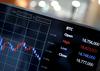 Bitcoin je z lahkoto presegel še 18 tisoč dolarjev, samo v decembru se je njegova vrednost zvišala za dobrih 90 odstotkov. Foto: Reuters