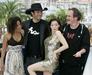 Rose McGowan med Robertom Rodriguezom in Quentinom Tarantinom ob promociji dvojčka Grindhouse. Foto: AP