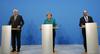Voditelji koalicijskih strank Horst Seehofer, Angela Merkel in Martin Schulz so po sklenjenem dogovoru o novi vladi v Berlinu stopili pred novinarje. Foto: Reuters