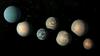 Ilustracija sedmero planetov iz sistema Trappist-1 glede na podatke, znane februarja 2018. Ozadje je sestavljeno iz nekoliko prilagojene podobe ozvezdij Oriona in Bika, kot bi bile verjetno vidne s same lokacije. Foto: Nasa/JPL-Caltech
