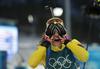 Hanna Öberg ob prihodu v cilj še ni vedela, da bo zmagala, a medalja je bila takrat že blizu. Foto: Reuters