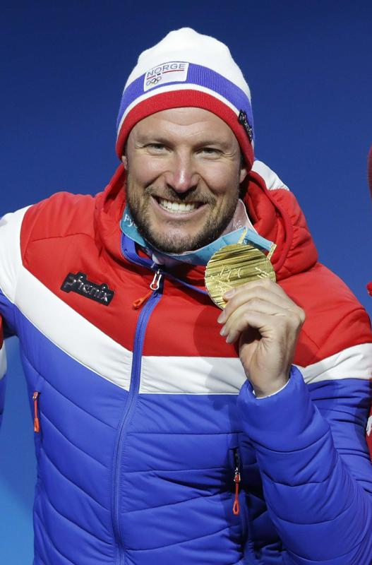 Veselje v Pjongčangu: postal je prvi norveški smučar, ki se je okitil s smukaškim zlatom na olimpijskih igrah. Foto: Reuters Veselje v Pjongčangu: postal je prvi norveški smučar, ki se je okitil s smukaškim zlatom na olimpijskih igrah. Foto: Reuters