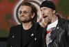 Bono (na fotografiji s kitaristom Edgeem) je bil eden od zvezdnikov, ki so jih leta 2016 razkriti panamski dokumenti bremenili skrivanja v davčnih oazah, a je takrat zanikal, da bi storil kaj narobe. Foto: Reuters
