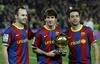 Andres Iniesta, Lionel Messi in Xavi