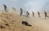 V ponedeljek je bilo v nasilju na meji med Gazo in Izraelom ubitih 60 Palstincev, še dva pa v torek. Foto: Reuters