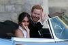 Sveže poročena princ Harry in Meghan Markle sta medene tedne neposredno po poroki tudi začasno odložila. Foto: Reuters