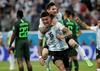 Marcos Rojo in Lionel Messi
