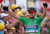 Peter Sagan je spet visoko dvignil roke, nova zmaga je tu. Po drugi etapi je osvojil še peto. Foto: Reuters