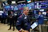 Torkovo trgovanje v New Yorku je prineslo nov rekord indeksa Nasdaq, navzgor pa se je obrnil tudi elitni Dow Jones, katerega vrednost je ob dnevnem vrhu znašala 25.286 točk. Foto: Reuters