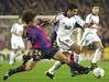 Carlos Puyol in Luis Figo